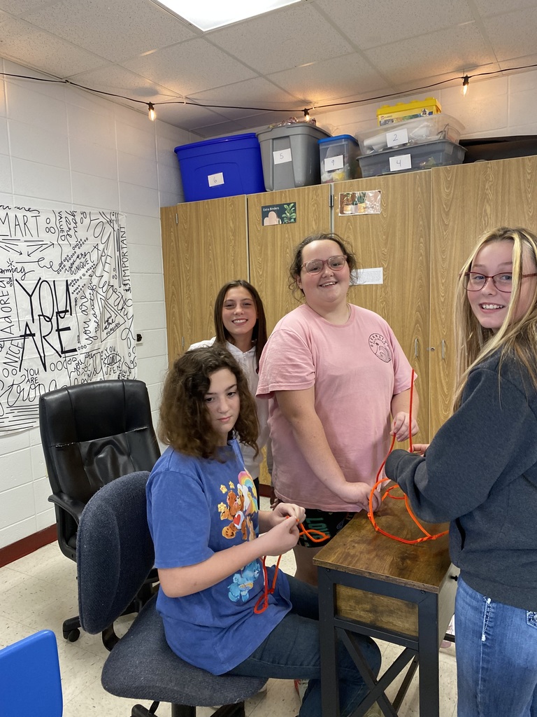 Students build a tower. 