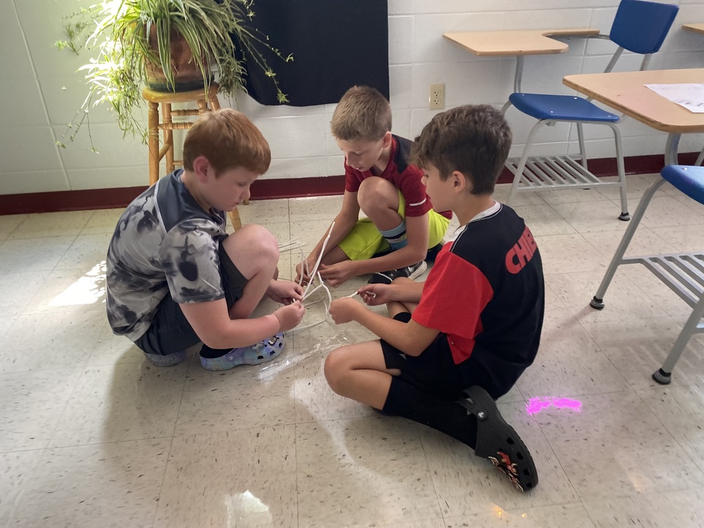 Students build a tower. 